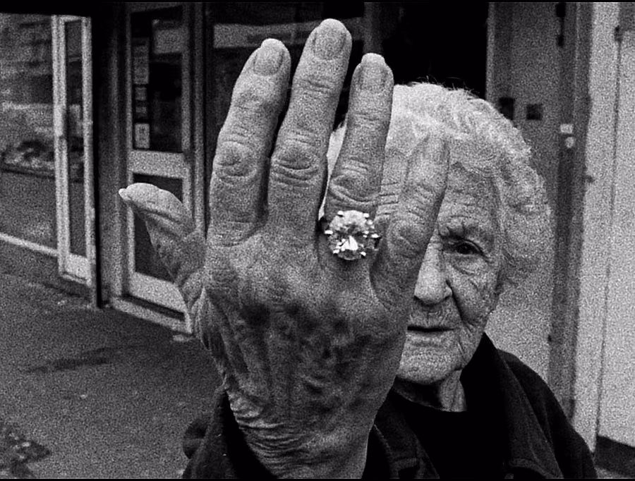 Close portrait with a diamond held over one eye from the original DARKMODE film