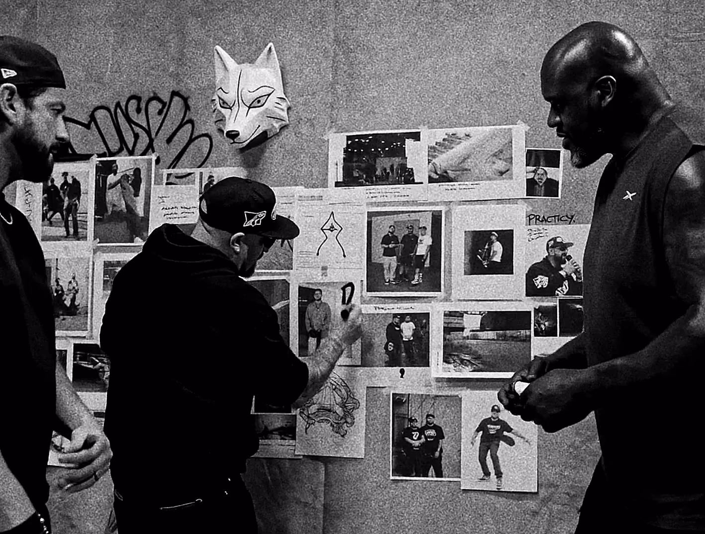 Shaquille O’Neal and the creative team reviewing the Practice direction wall